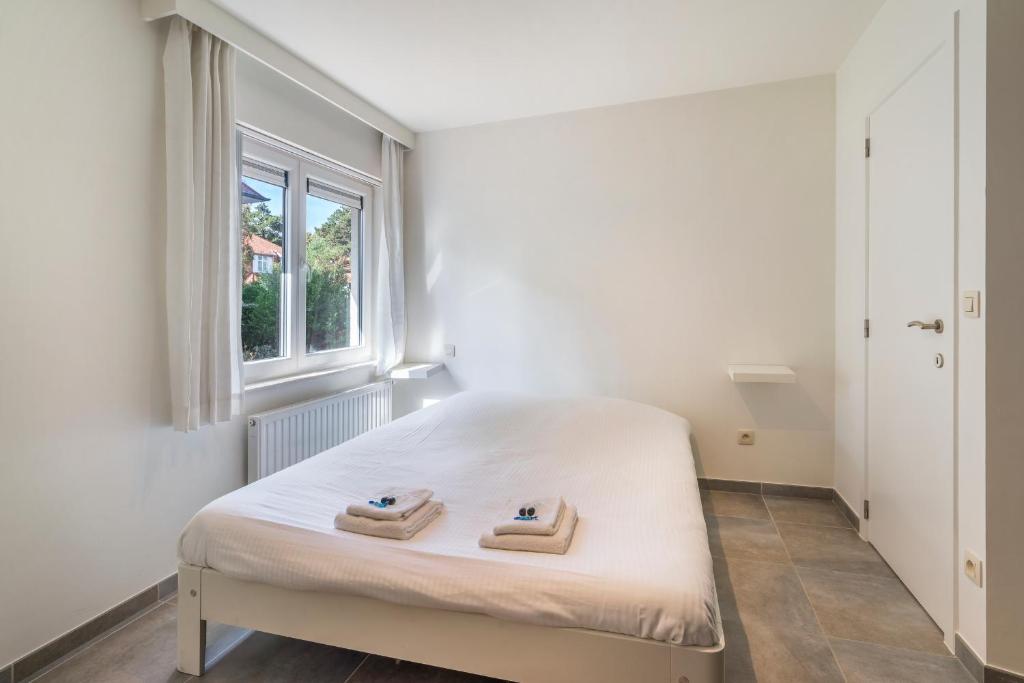 Ruim appartement 1min van strand met privé parking photo 2
