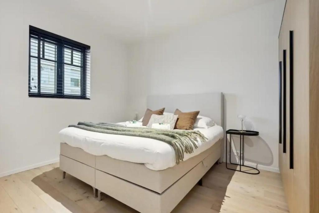 Triton luxe gelijkvloers appartement met tuin en gratis garage photo 2