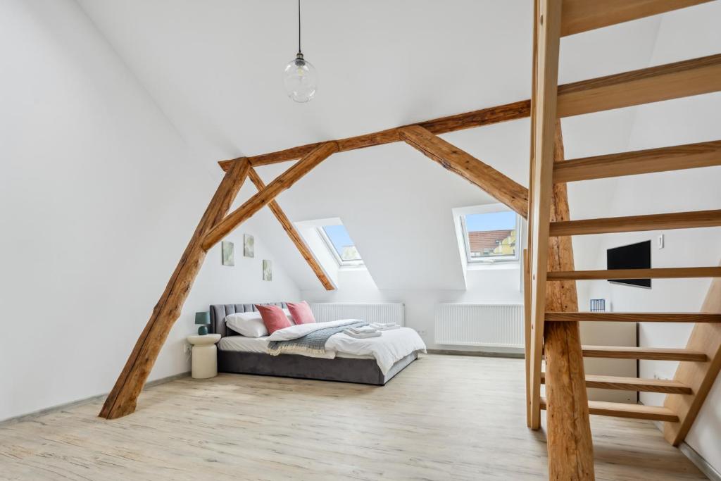 Spacious two-storey apartment with a terrace in the city center — photo 1