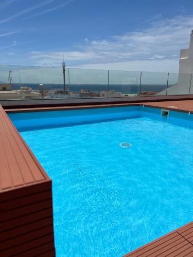 Zona centrica pero tranquila con piscina y fibra — photo 1