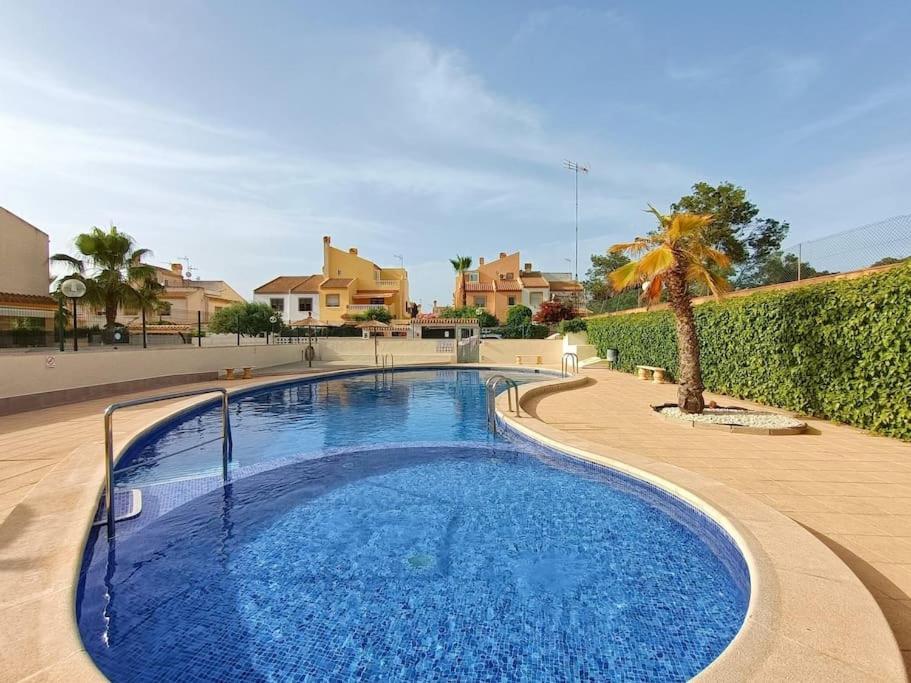 Sunny House Torrevieja with communal pool and garden — photo 1