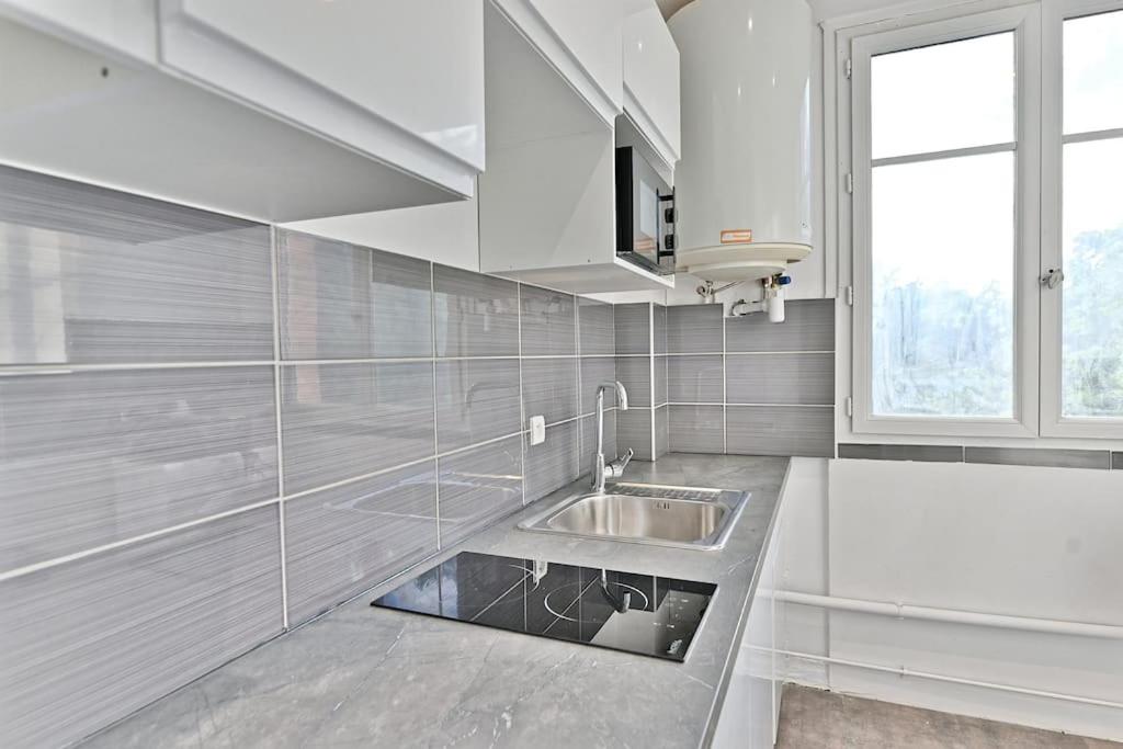 Appartement Cosy Vue sur Paris Bois de Boulogne photo 3