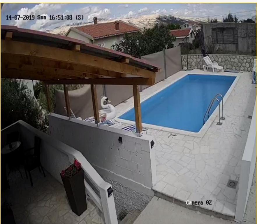 Seaside apartments with a swimming pool Pag - 17752 photo 3