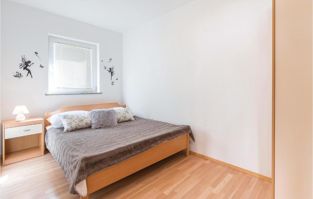 Cozy Apartment In Povljana With Kitchen photo 3