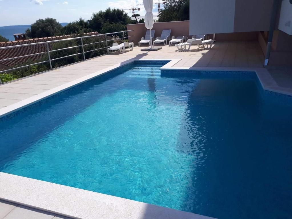 Apartments Lo - Sea view apartment with swimming pool — photo 1