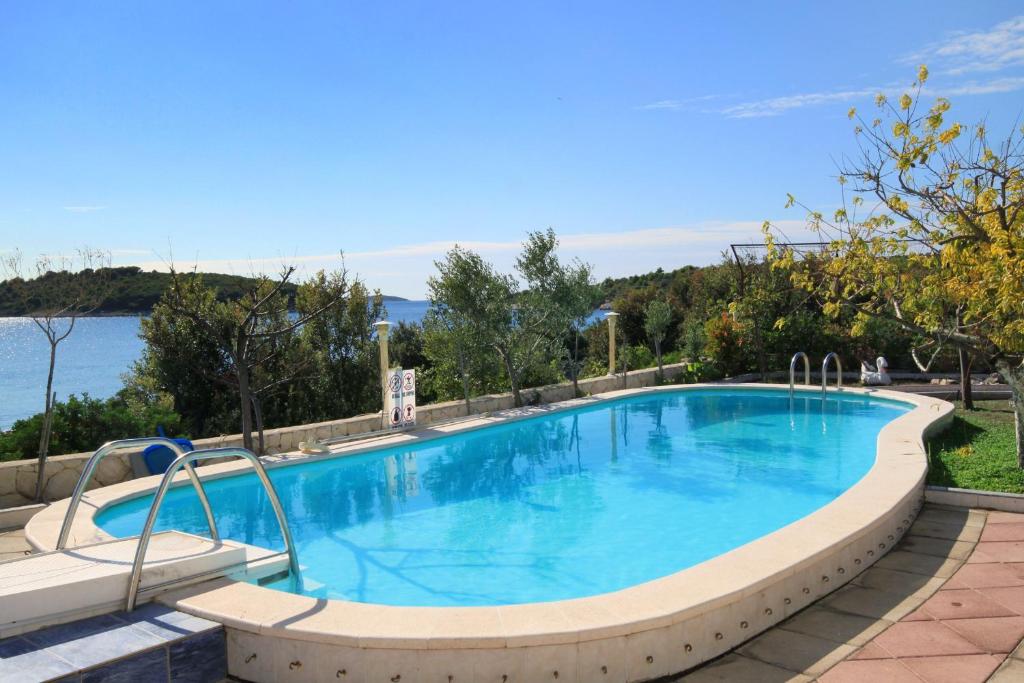 Family-friendly apartments with swimming pool Zecevo Rtic photo 3