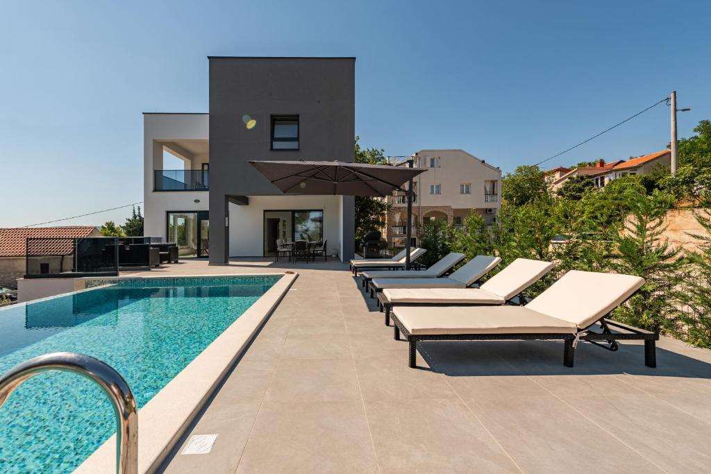 Seaview Villa A`More with heated pool photo 3