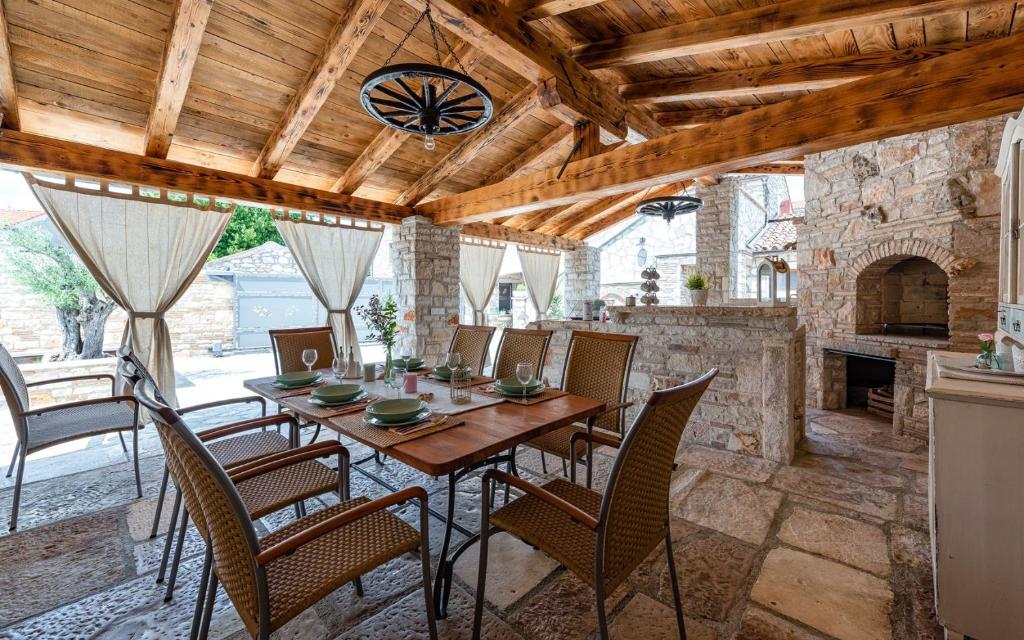 Rustic stone holiday house with pool photo 3