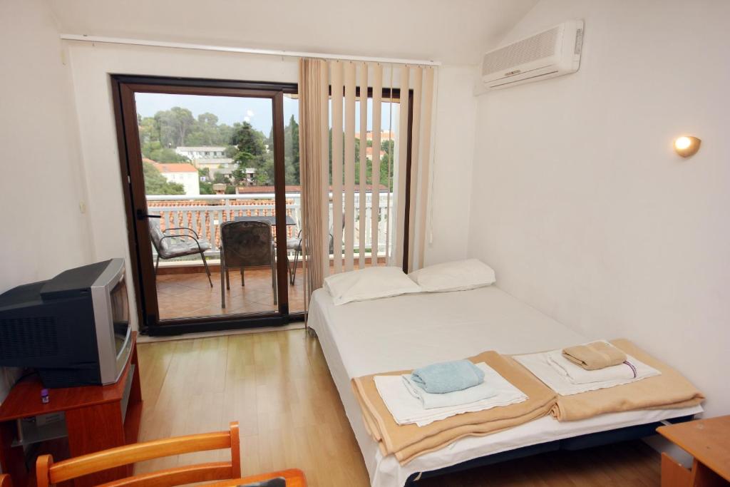Apartments with a parking space Dubrovnik - 9057 photo 2