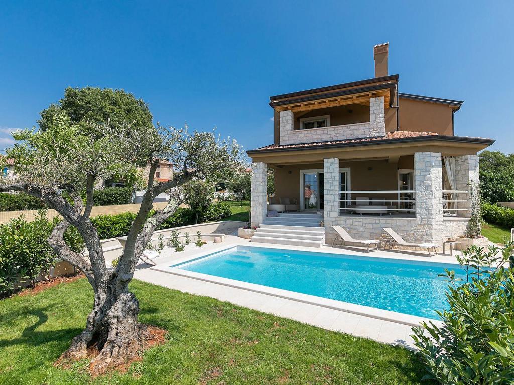 Traumhafte Villa mit beheizbarem Privatpool — photo 1