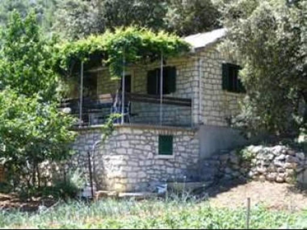 Secluded house with a parking space Postira — photo 1