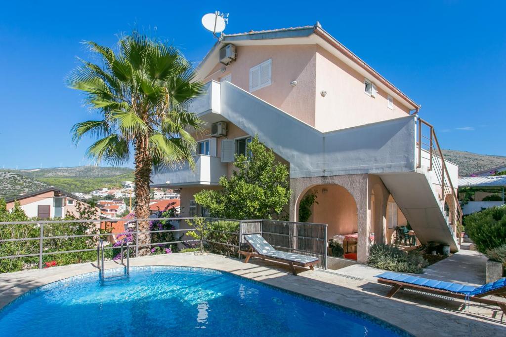 Family-friendly apartments with swimming pool Seget Vranjica — photo 1