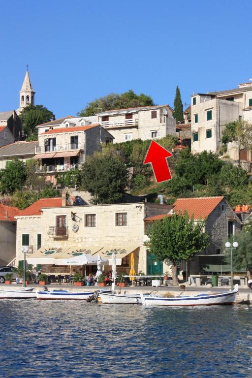 Apartments by the sea Povlja — photo 1