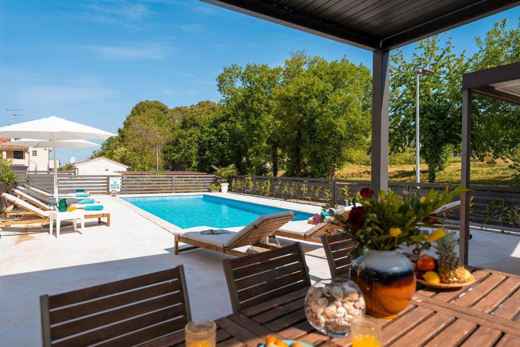 Strandnahes Apartment mit Jacuzzi — photo 1