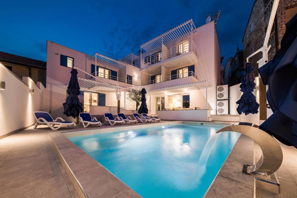 Family-friendly apartments with swimming pool Selce — photo 1