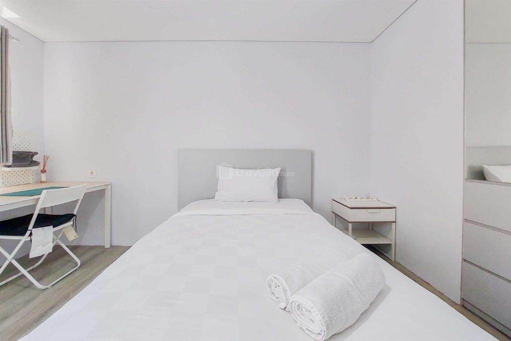Homey and Modern Studio at Bintaro Icon Apartment By Travelio photo 3