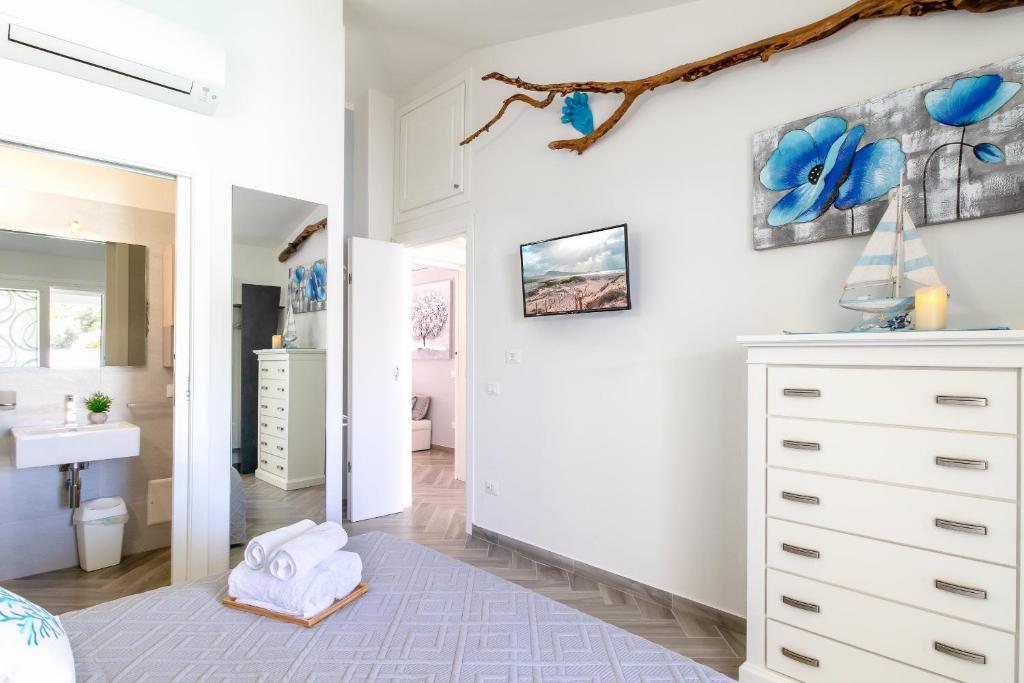 SUNSET BAY POOL VILLA SARDINIA with private heated pool photo 3