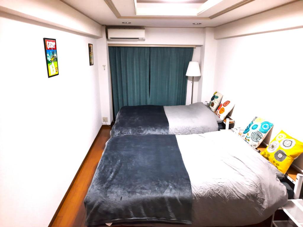 Shinjuku Harusame Apartment -Twin room- — photo 1