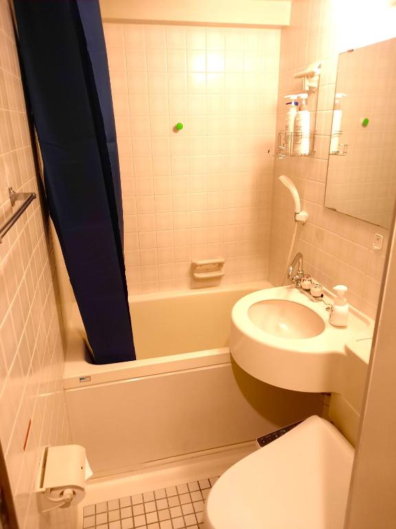 Shinjuku Harusame Apartment -Twin room- photo 3