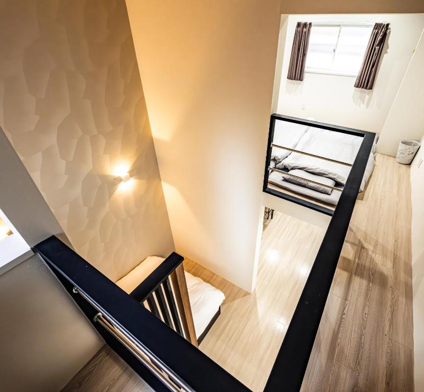 匠の家 大阪城近くの高級感あふれる吹き抜けの家 A Luxurious Home with a Grand Atrium Near Osaka Castle photo 2