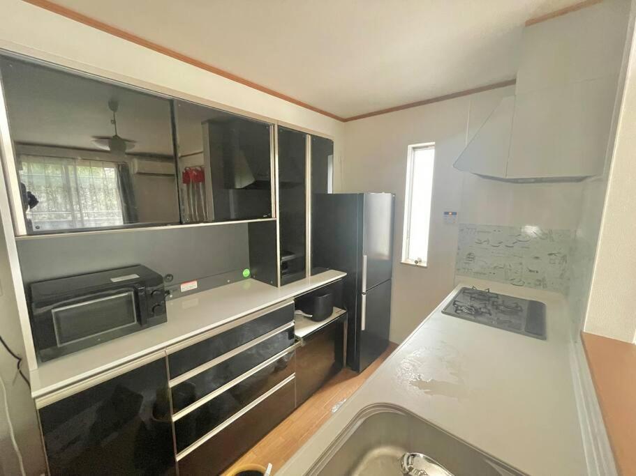 Tommy's house 東京都内では貴重な無料駐車場付で大地震でも安心の新しい家 photo 3