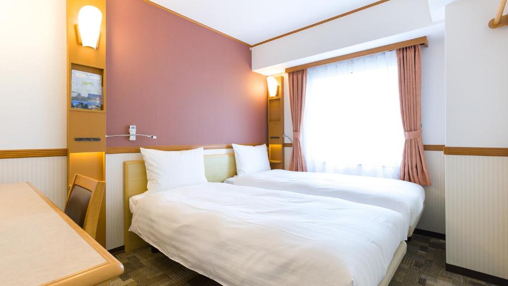 Toyoko Inn Tokyo Shinagawa-eki Takanawa-guchi photo 3