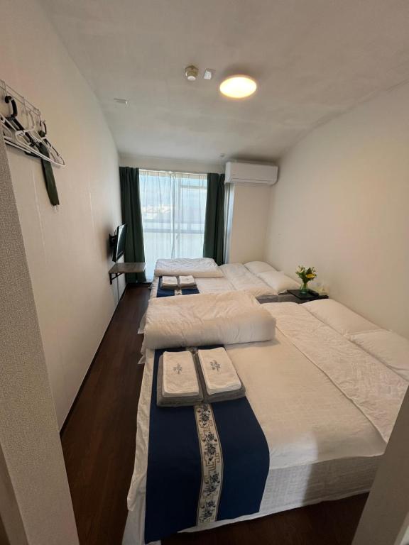 彦根びわこホテル裏のマンション 一室貸し切り50台無料駐車場付き台所あり自転車貸出可 BbQ可 ペット同伴可 photo 2