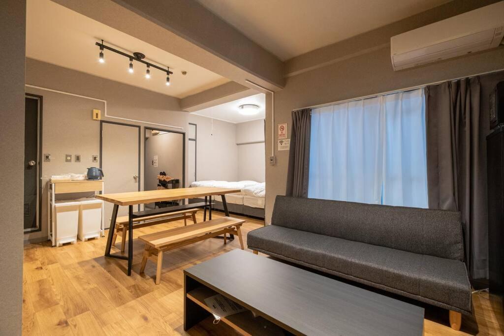 Tasone Urban Stay Osaka なんば日本橋南不夜城707 — photo 1