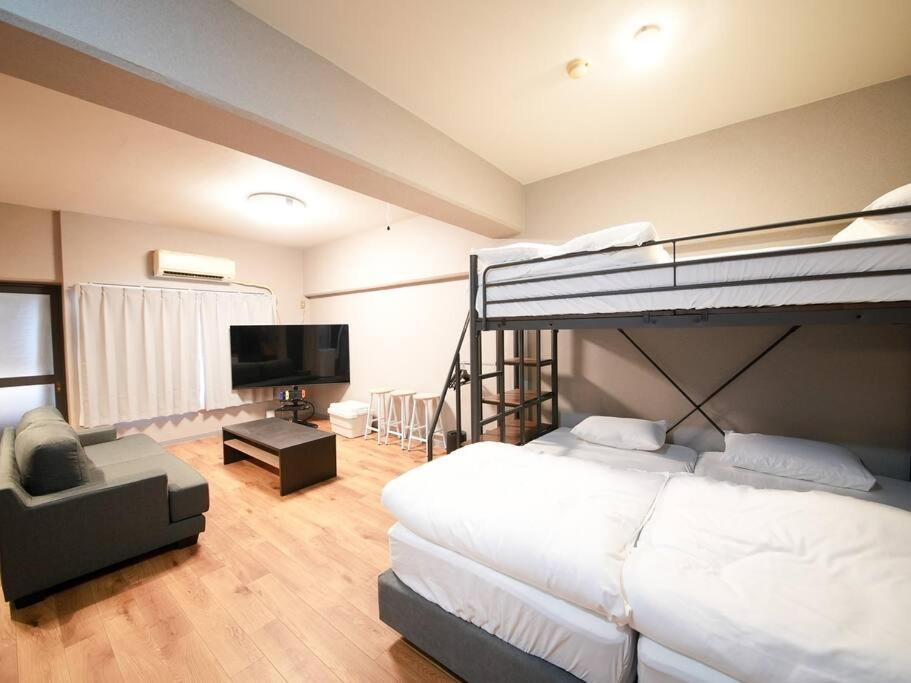 TasoneUrbanStayOsaka なんば日本橋南不夜城704 — photo 1