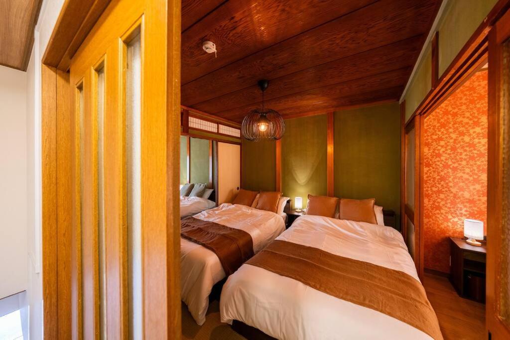 鶴見橋ゲストハウス 地下鉄駅徒歩4分で難波と梅田直通の無料駐車場付きゲストハウス photo 2