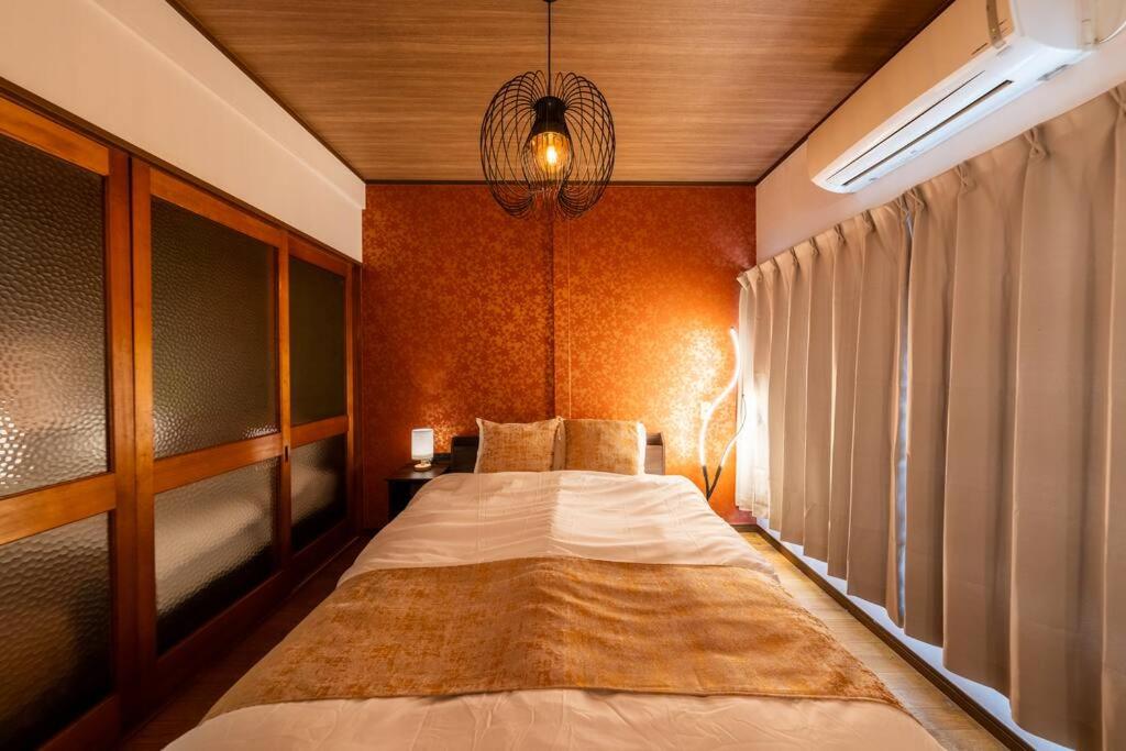 鶴見橋ゲストハウス 地下鉄駅徒歩4分で難波と梅田直通の無料駐車場付きゲストハウス photo 3