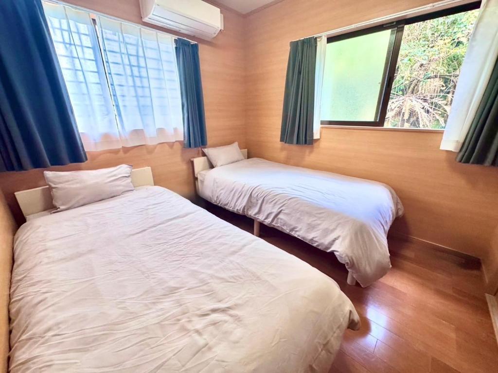 AZホテル Inn 奄美万屋 - Villa with private outdoor Jacuzzi photo 2