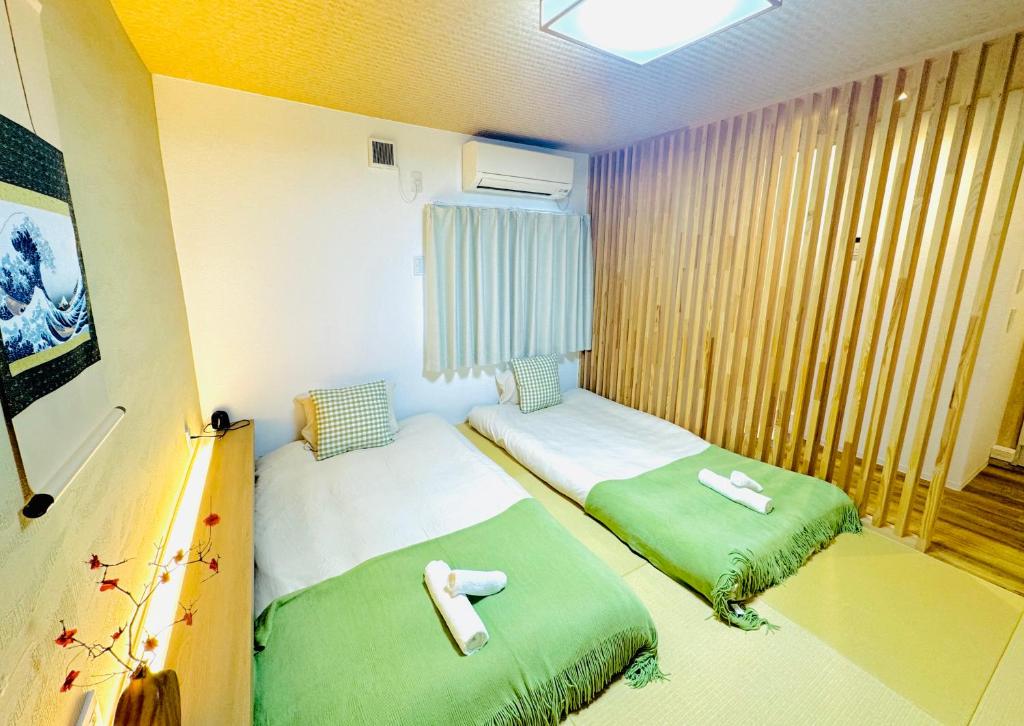Tsukimi Entire House for 8 &Near Public Transport Direct to Airport &Free Parking &3 Baths 3 Toilets &Washer Dryer& Direct to Namba Shinsaibashi and Tsutenkaku photo 2