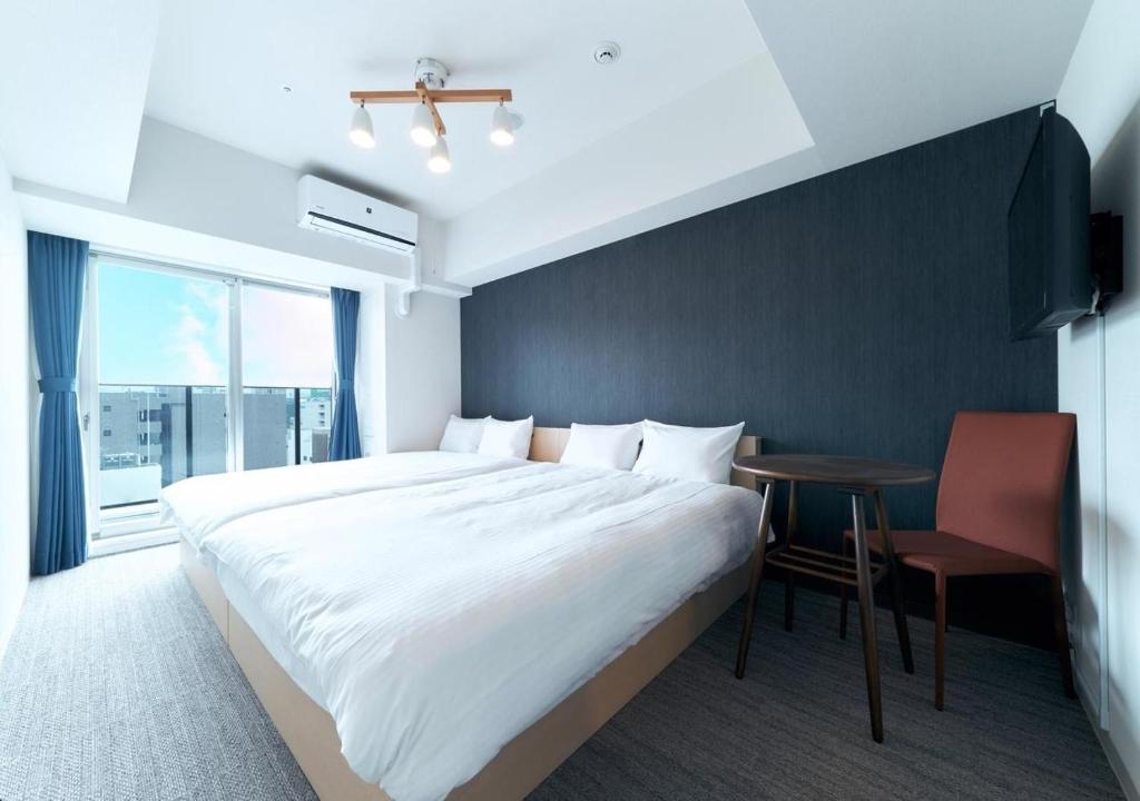 STAYAT OSAKA SHINSAIBASHI east - Twin Room — photo 1