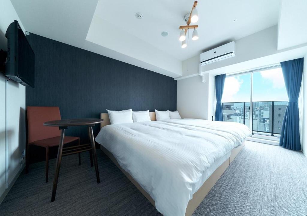 STAYAT OSAKA SHINSAIBASHI east - Twin Room photo 2