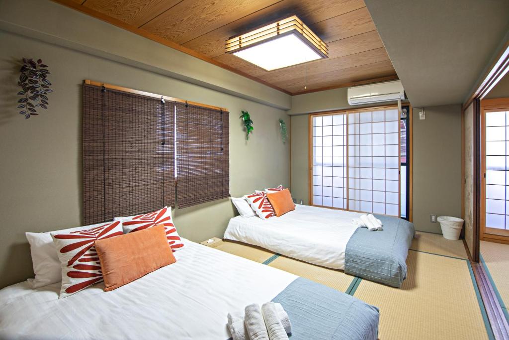 天満橋 Guest House#有电梯 #步行大阪城 #赏樱花必打卡点 #直达梅田 京都 #免费wifi photo 2