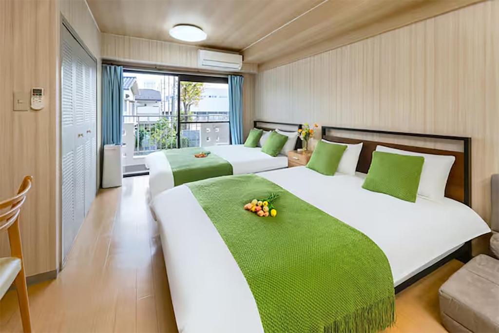 Room 204 Nishi-Shinjuku Gochome 9 minutes walk 40 square meters Sleeps up to 6 people — photo 1