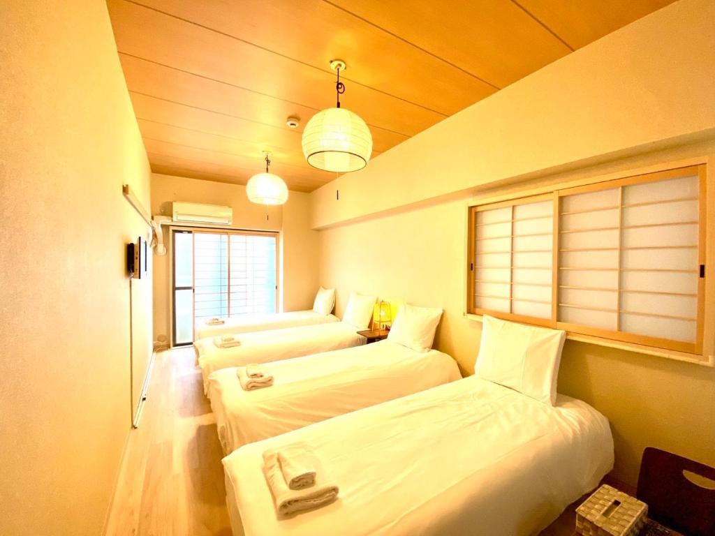3 minutes on foot from Dotonbori East Entrance 5 minutes on foot from Shinsaibashi area traditional Japanese-style room photo 2