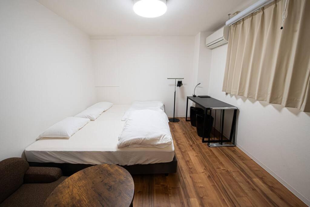 TasoneStayOsaka 心斎橋東周防町1st401 — photo 1