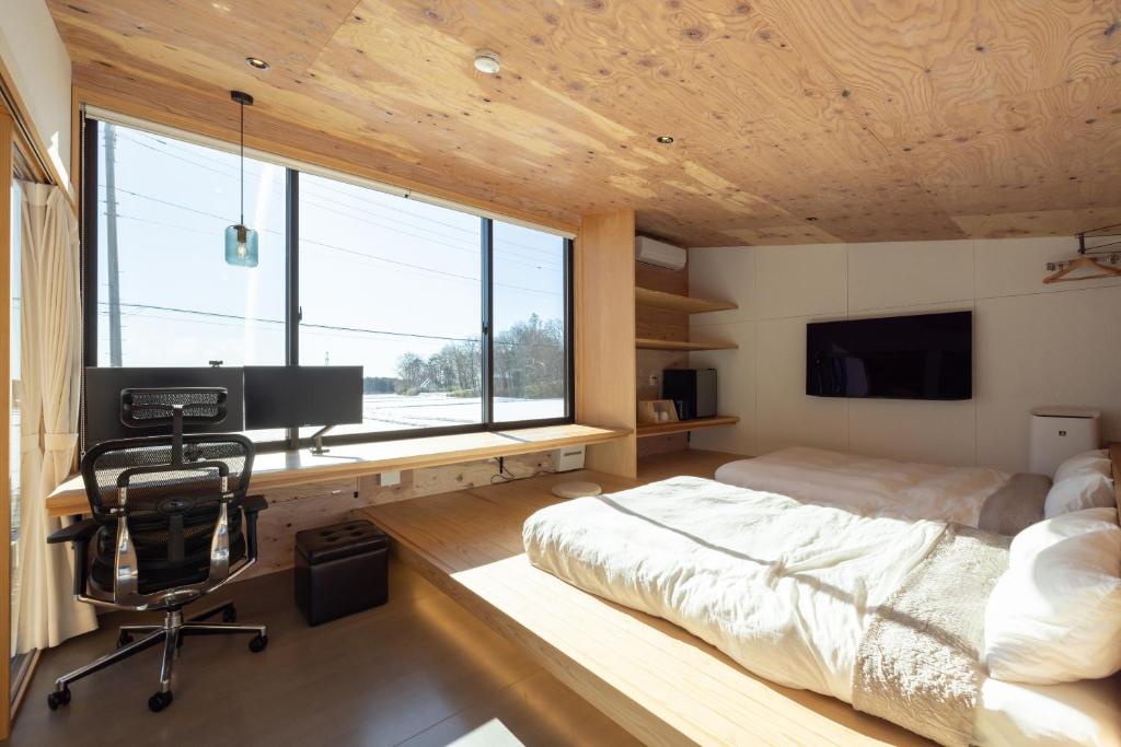 森deワーケなすっぽ 木の温もりとホテルライクな佇まい 森のバレルサウナ — photo 1