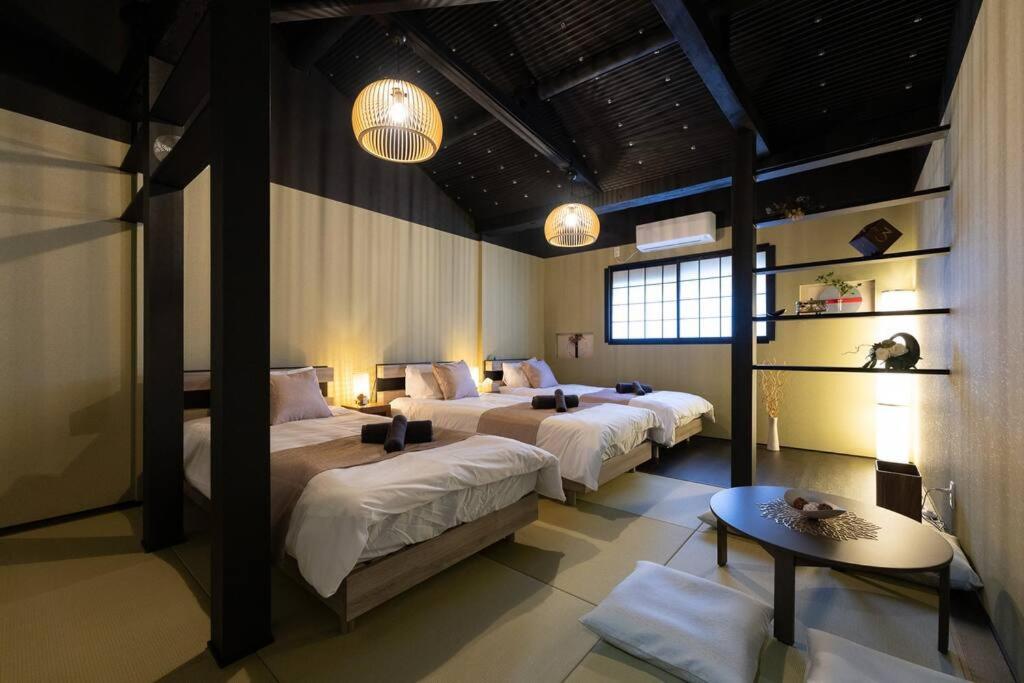ゆうじ 室内をフルリノベーション 清潔なお部屋 ベッド7台 2つのシャワールーム photo 2