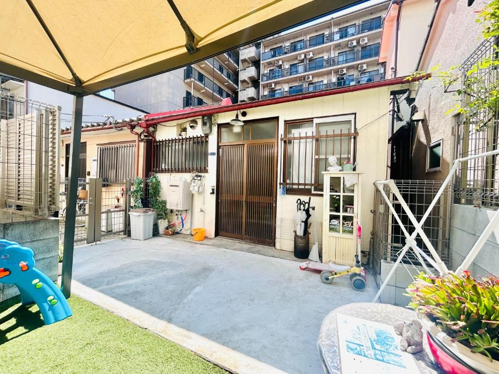 天下茶屋駅5分、専用庭付き平屋—KIK Iハウス — photo 1