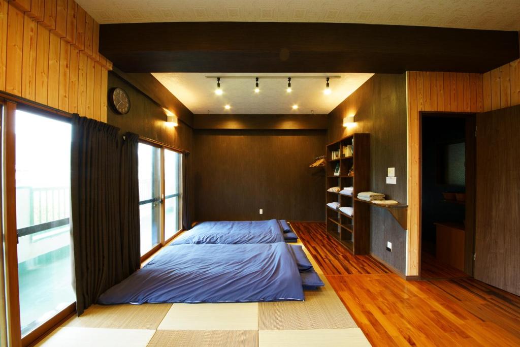 奄美ゲストハウス矢之脇町-Amami Guesthouse Yanowakicho- — photo 1
