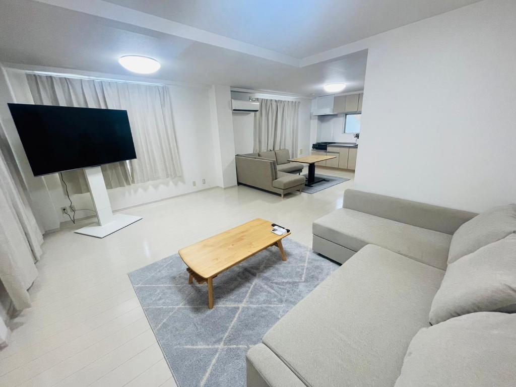 SUITE YONEGAHAMA l 米が浜通 — photo 1