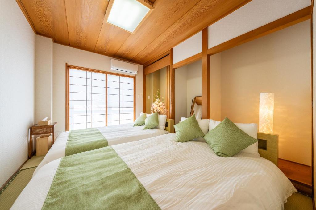 ちよ 桜と過ごすお部屋 usjまで電車で10分 4つの寝室 お風呂2台 トイレ4台 photo 2