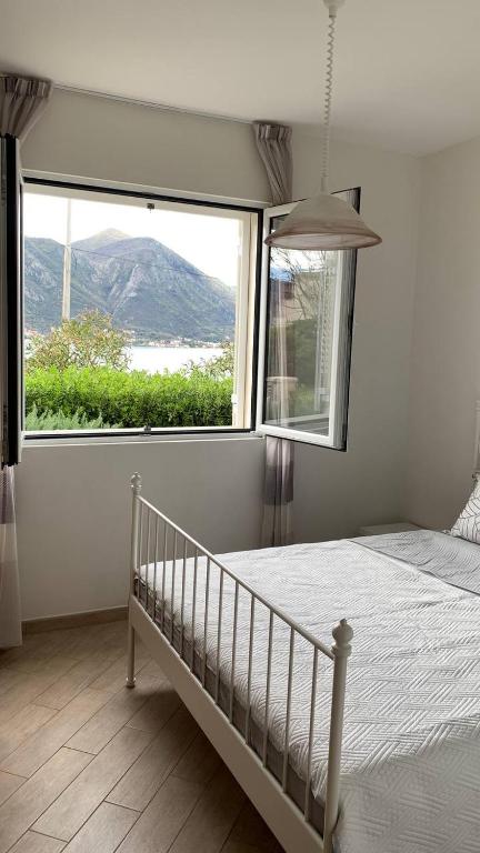 Modern bright 2 bedroom apartment with panoramic view of Boka Kotorska Bay photo 2