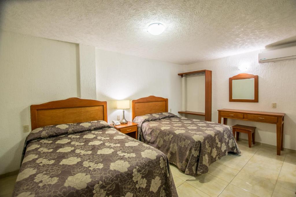 Suites Poliforum Inn — photo 1