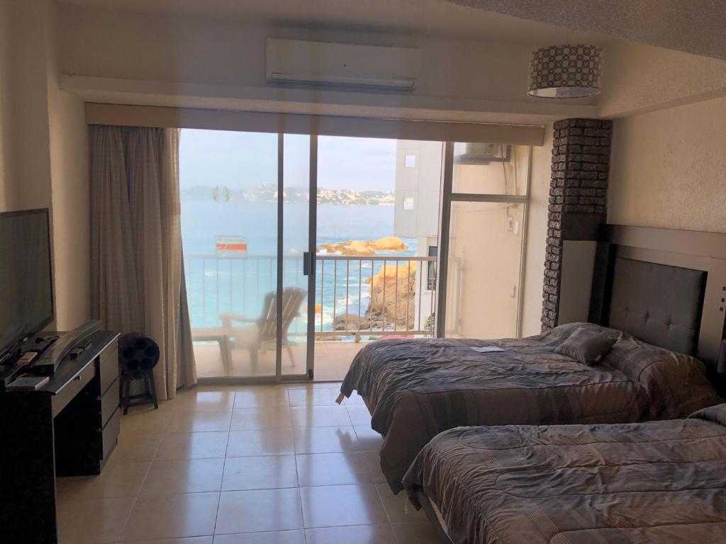 SUITE EN TORRES GEMELAS a pie de playa 1403 N photo 2