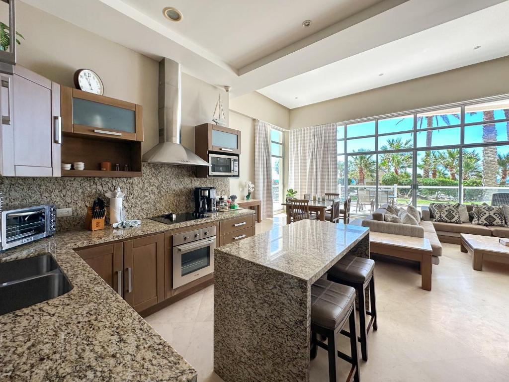 Splash into Style Ground Floor Poolside Condo #103 photo 2