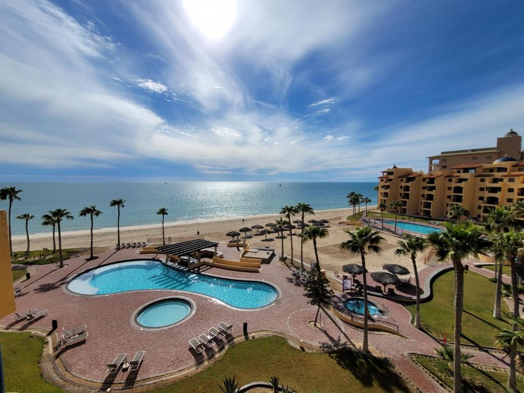 Two-Story 3-Bedroom Beachfront Penthouse at Princesa Resort - BeachBumCondos photo 2
